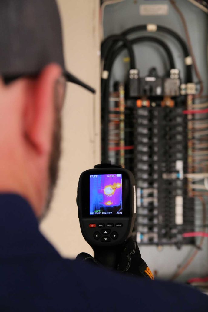 Clear Choice Owner, Josh Rose Using Infrared Imaging device